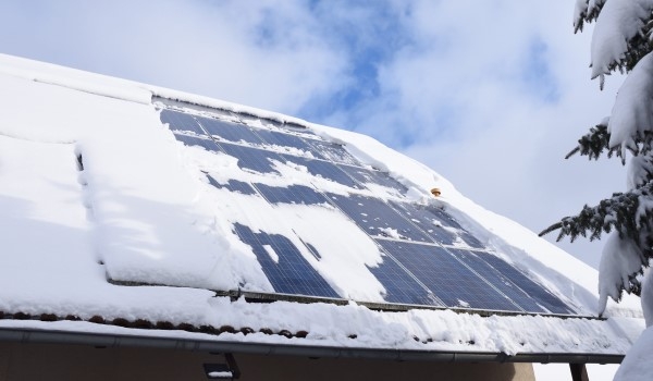 Solar panels covered with snow